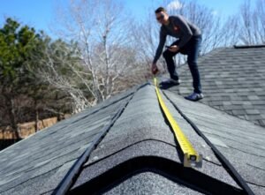 A roofing specialist conducting a thorough inspection of the roof.
